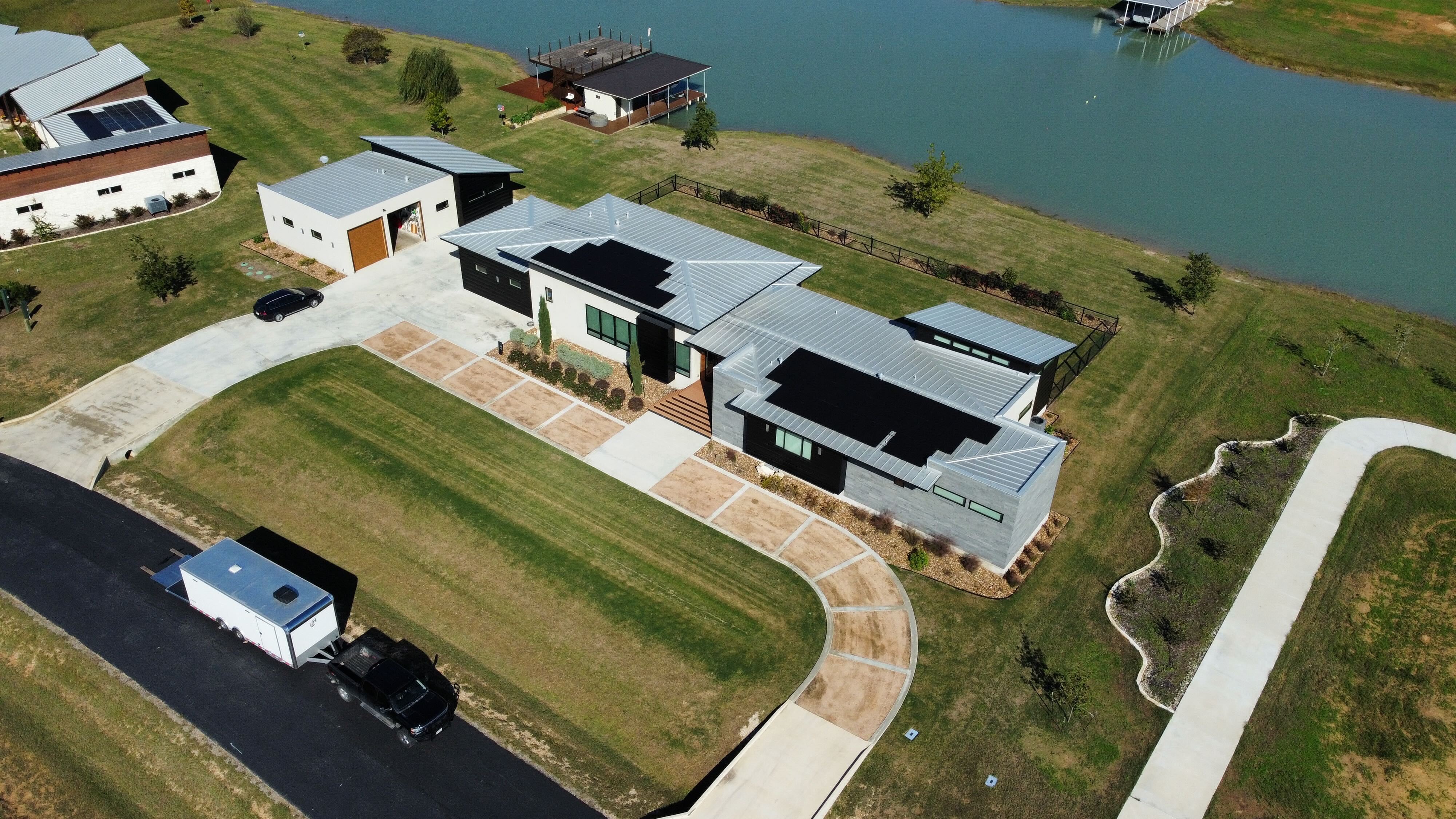 Aerial view of a roofio solar installation at a home in Martindale, Texas
