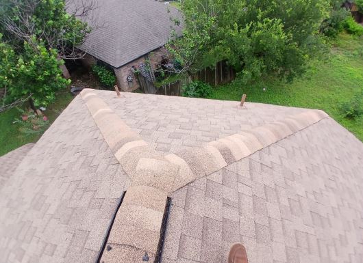Completed shingle roof replacement on a home in San Antonio, Texas