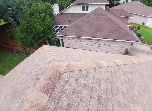 Finished roof replacement viewed from the ridge