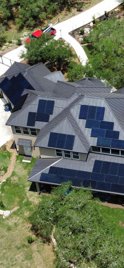 Rooftop solar array installed across multiple roof planes on a home in Woodville, Texas