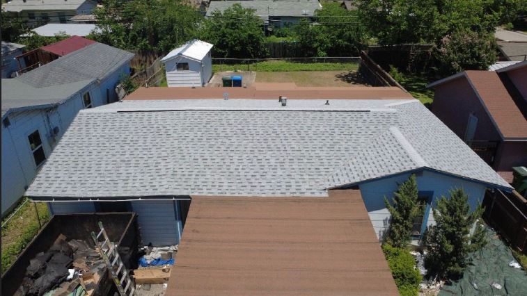 Aerial view of a completed roof replacement by roofio in San Antonio, Texas