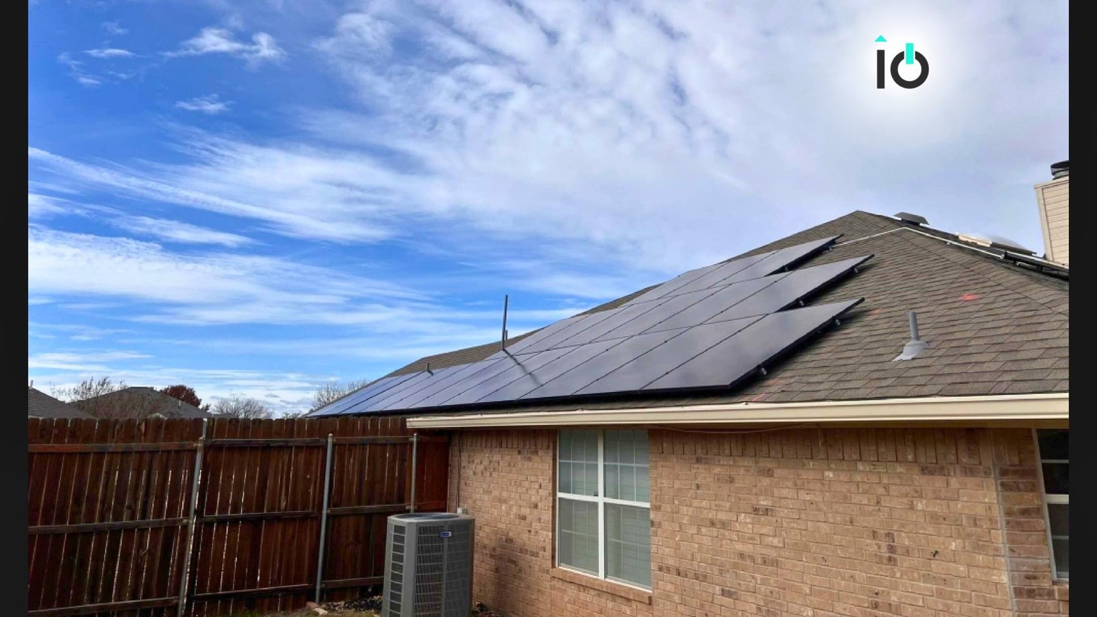 Brick home with solar panels on the roof