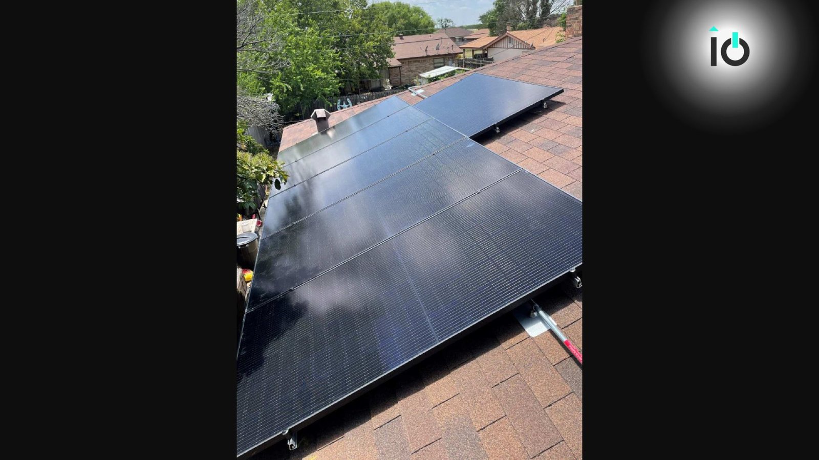 Black solar panels installed on a residential roof