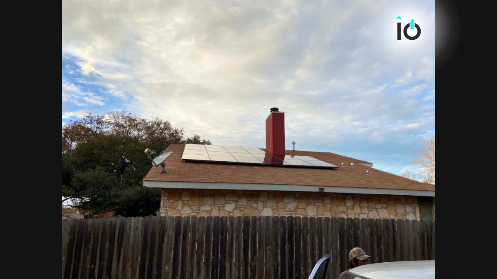 Rooftop solar panels along a residential roofline