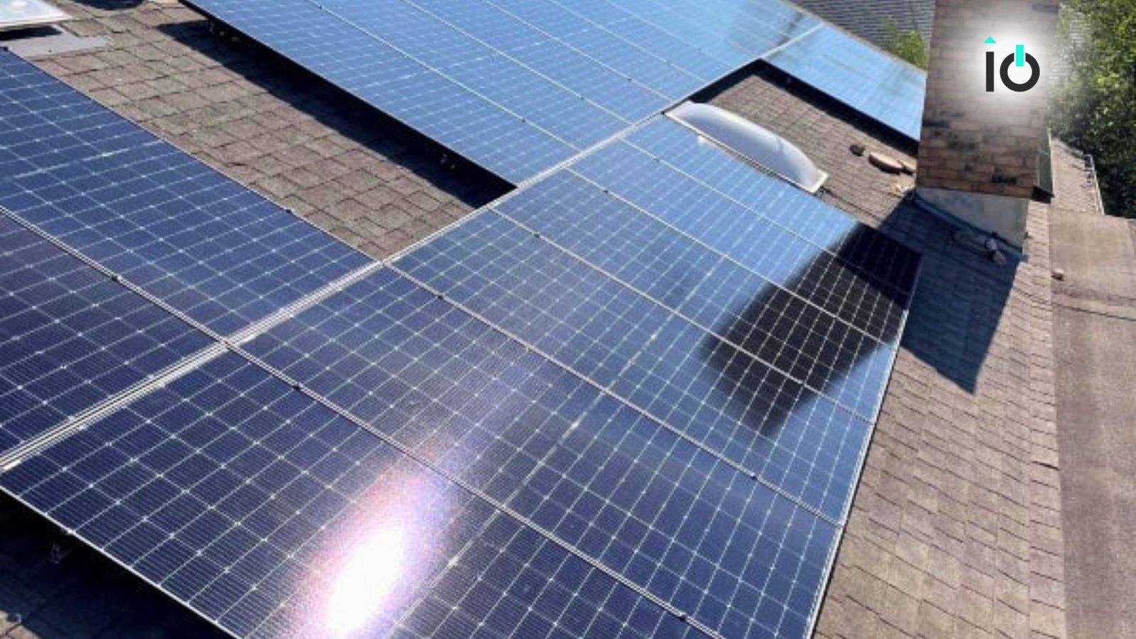 Close view of solar panel rows on a roof