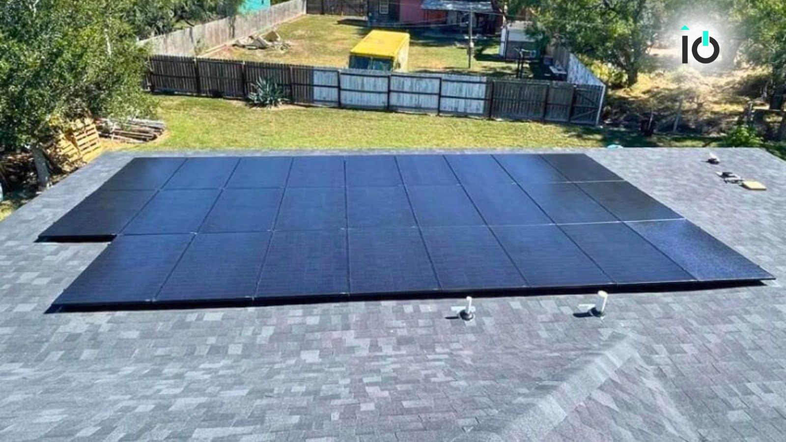 Large solar array installed on a flat residential roof