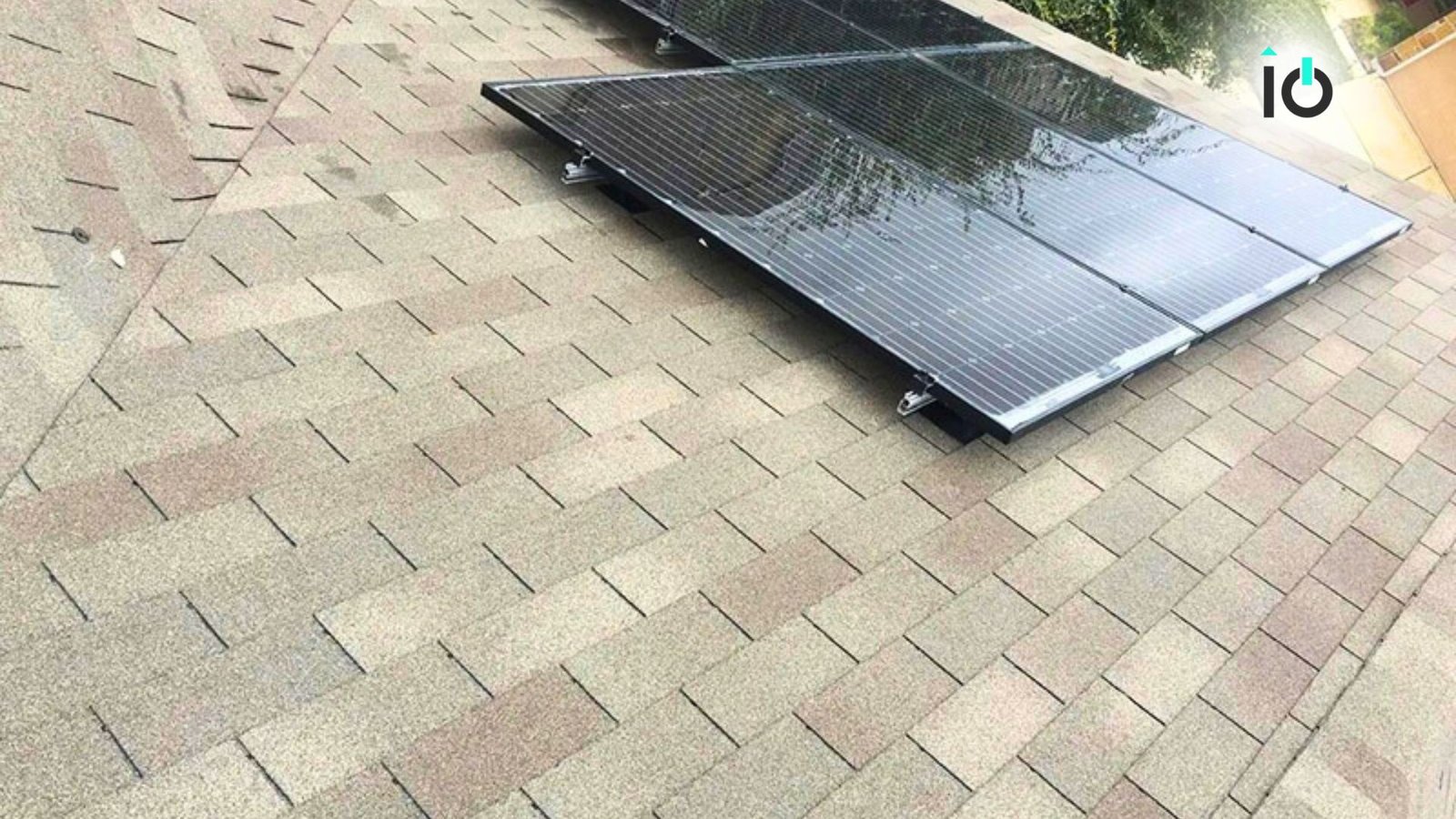 Solar panels installed on a shingle roof
