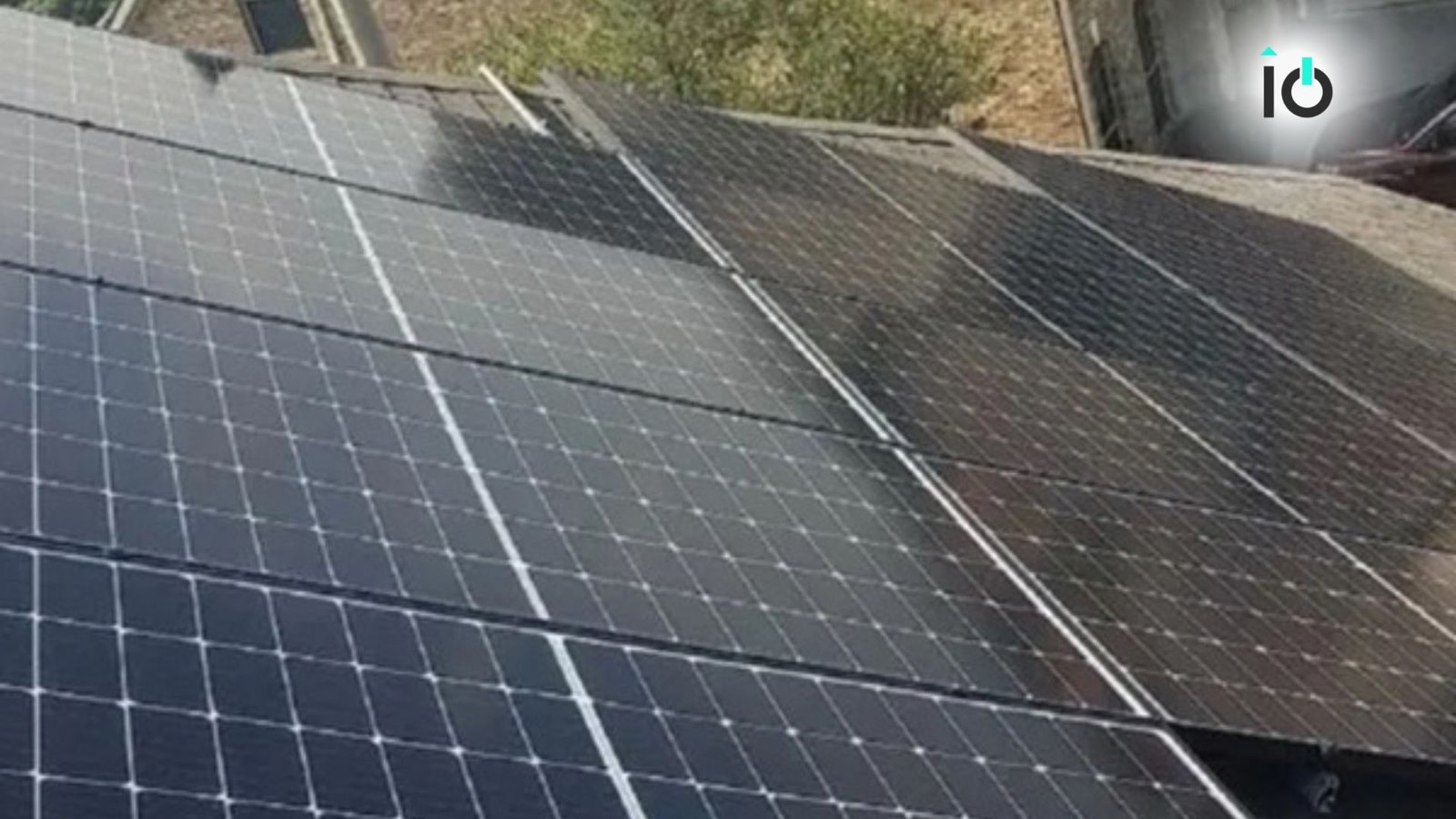 Close view of solar panel rows on a residential roof