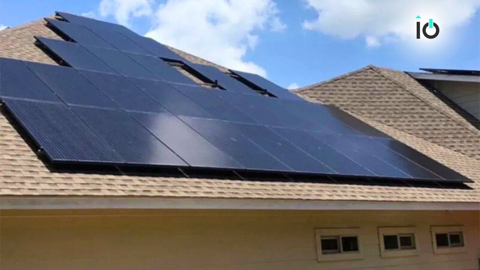 Solar panels installed on a stone home's roof